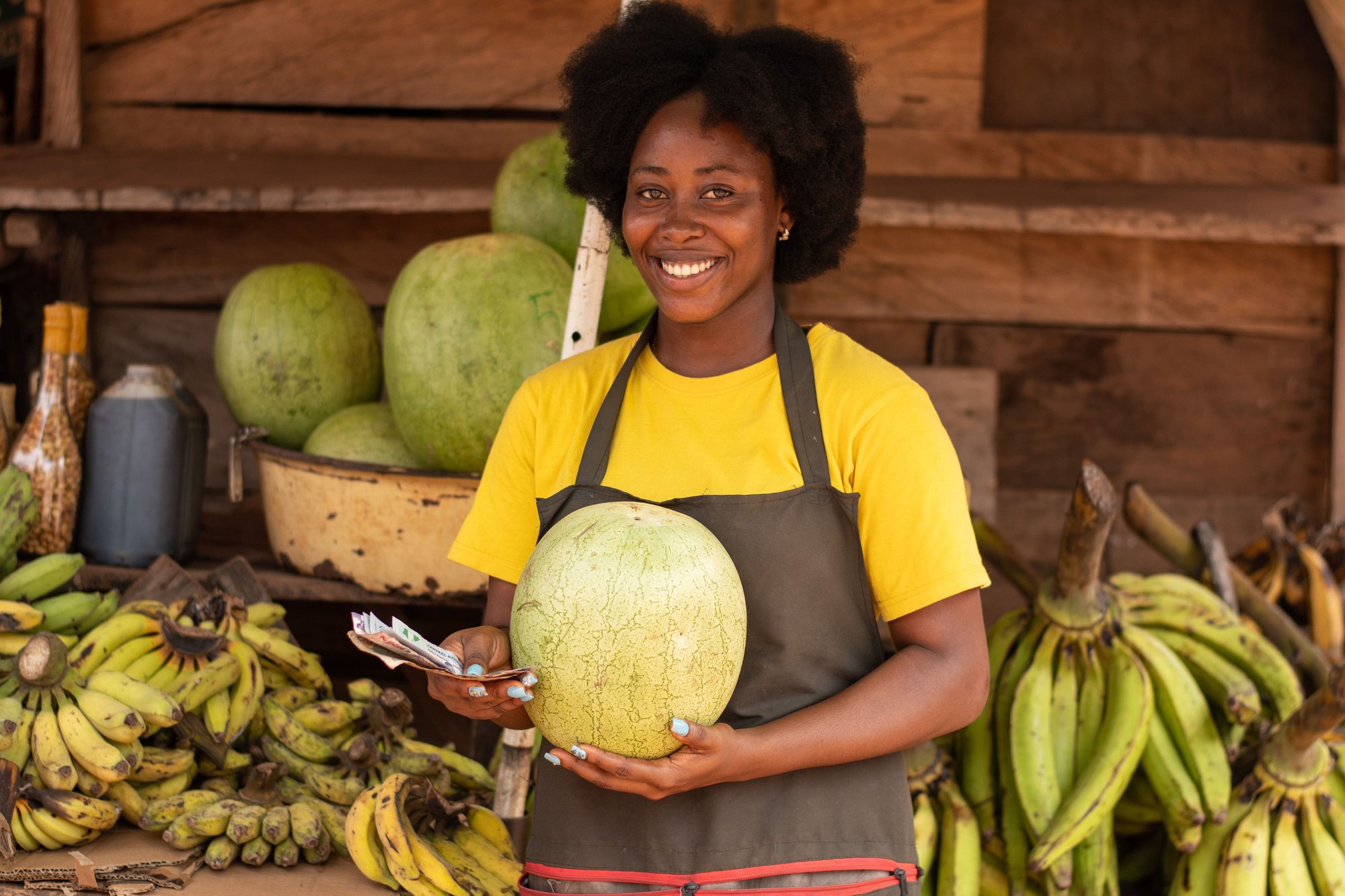 lady-holding-watermelon-money-market